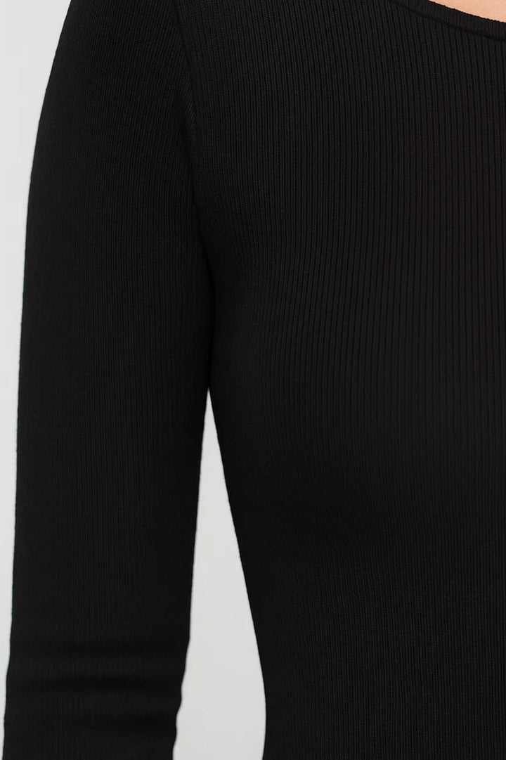 Lange aansluitende jurk | Lange mouwen | In rekbare gebreide stof